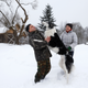 Dmitry Shamovich and his wife Anastasia Kuzmenkova play at their homestead in Sosnovy Bor.